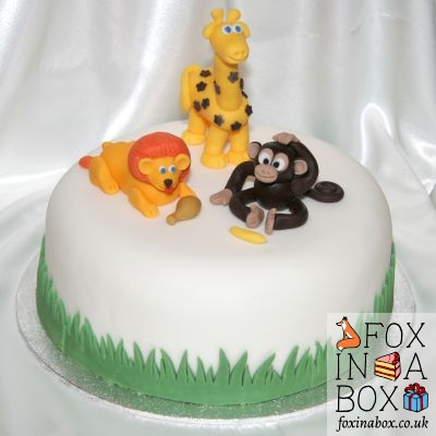 Cake with lion, giraffe and monkey